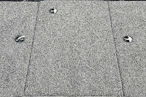 Slide: The Image of Gray textured surface with metal fixtures, Nitro Z17 2026 model. - 4