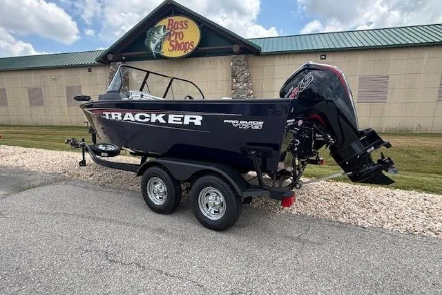 The Image of 2026 Tracker Pro Guide V-175 WT boat on trailer, parked outdoors. - 0