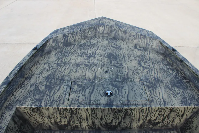 Slide: The Image of 2026 Tracker Grizzly 1754 Utility boat with camouflage pattern, viewed from above. - 11