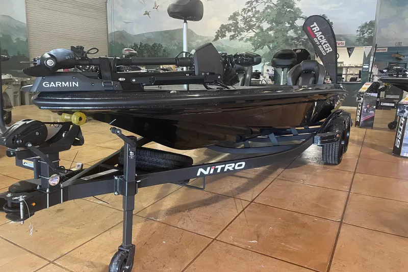 The Image of 2026 Nitro Z20 XL Pro boat with Garmin equipment on display indoors. - 0