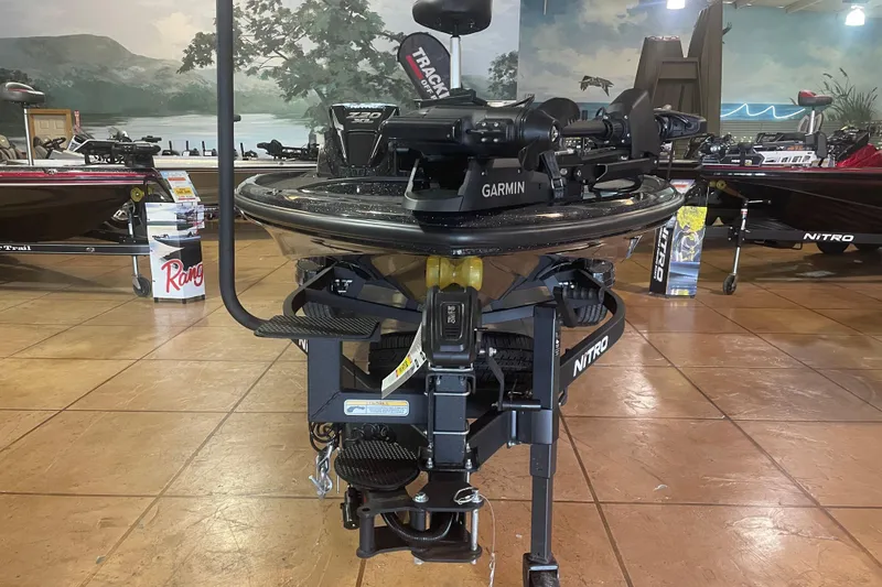 Slide: The Image of 2026 Nitro Z20 XL Pro boat with Garmin equipment displayed indoors. - 5