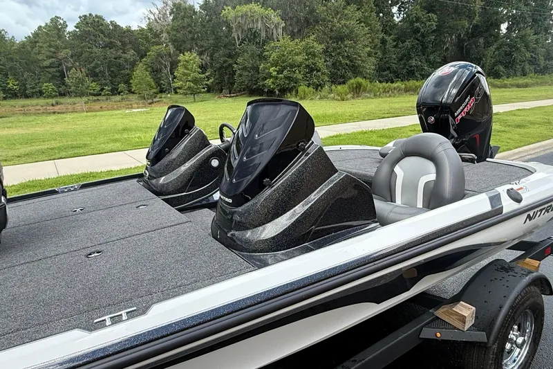Slide: The Image of 2026 Nitro Z17 boat with dual consoles and sleek design, parked on a trailer. - 3