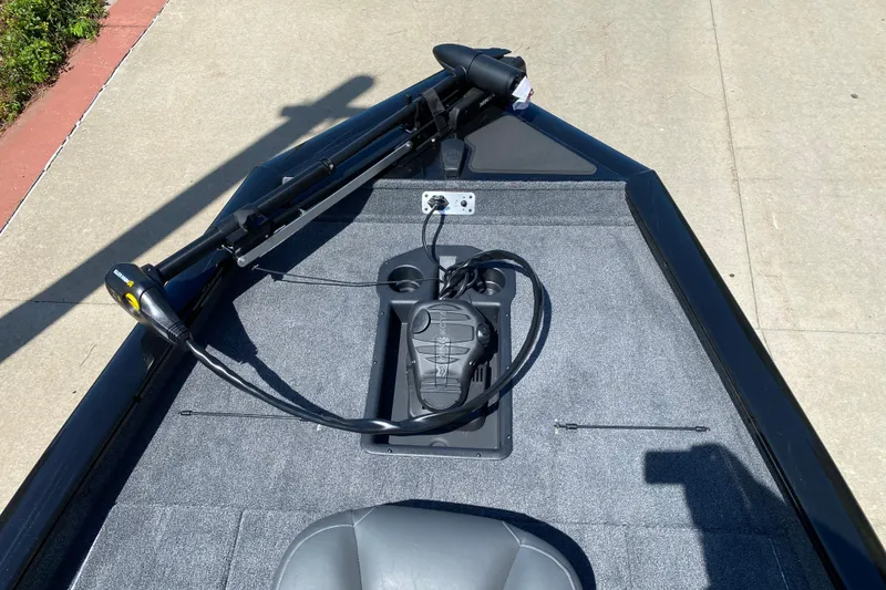 Slide: The Image of 2026 Tracker Pro Team 190 boat deck with trolling motor and foot pedal. - 3