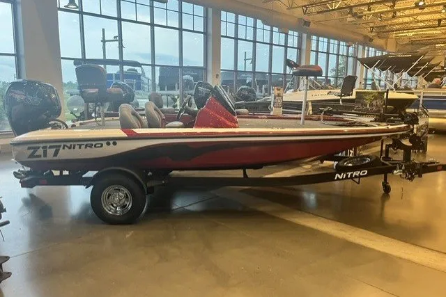 Slide: The Image of 2026 Nitro Z17 boat displayed indoors, featuring sleek design and modern features. - 6