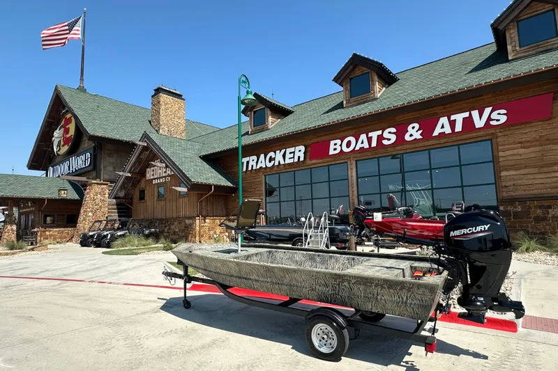 The Image of 2026 Tracker Grizzly 1648 Utility boat outside Tracker Boats & ATVs store. - 2