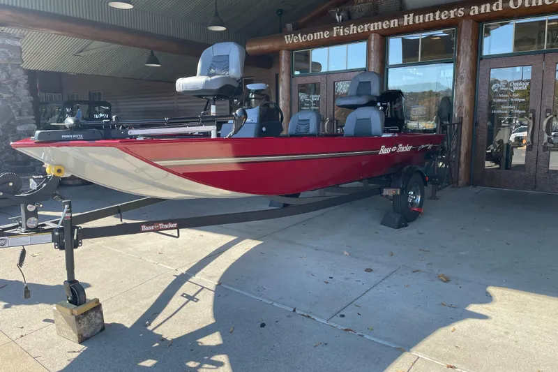 The Image of 2026 Tracker Bass Tracker Classic XL boat displayed outside a store. - 0