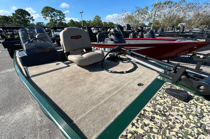 Slide: The Image of 2026 Tracker Bass Tracker Classic Limited boat with seating and fishing equipment. - 3