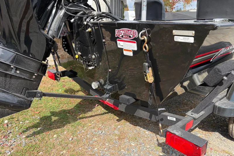Slide: The Image of 2026 Tracker Bass Tracker Classic XL boat trailer hitch and motor detail. - 66