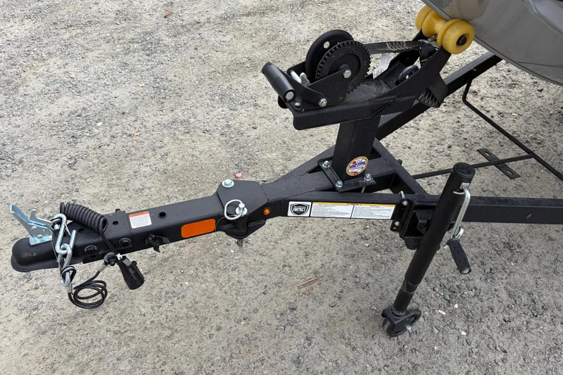 Slide: The Image of Trailer hitch of 2026 Tracker Bass Tracker Classic XL on gravel surface. - 74