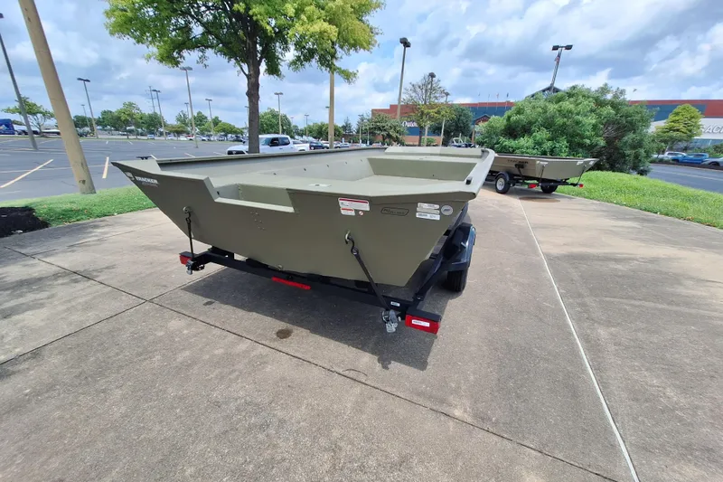 Slide: The Image of 2026 Tracker Grizzly 2072 Utility boat on trailer in parking lot. - 3