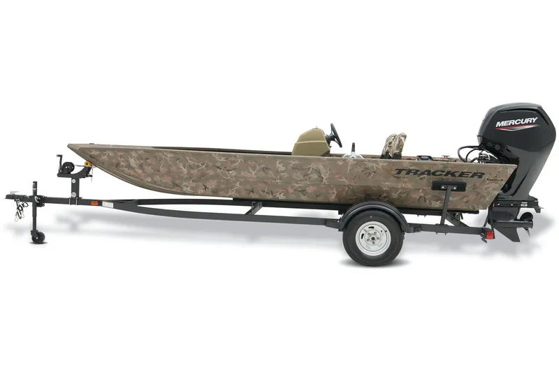 The Image of 2026 Tracker Grizzly 1754 SC boat on trailer outside Bass Pro Shops. - 1