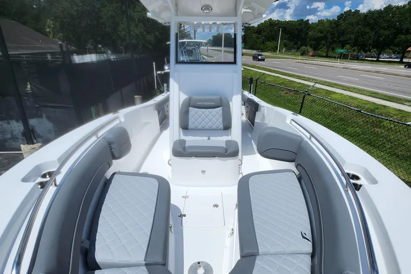 Slide: The Image of 2026 NauticStar 252 Legacy boat with spacious seating and modern design. - 11