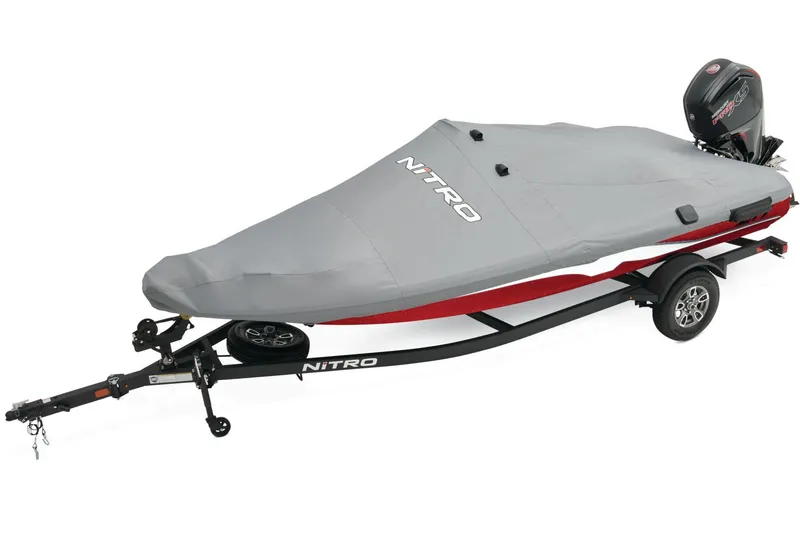 Slide: The Image of Steering wheel of a 2026 Nitro Z17 boat, parked outdoors under a clear sky. - 7