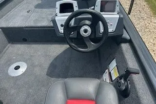Slide: The Image of Steering console of 2026 Tracker Pro Team 175 Crappie Edition with Lowrance display. - 3
