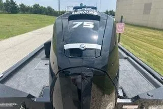 Slide: The Image of 2026 Tracker Pro Team 175 Crappie Edition boat with three seats and steering console. - 4