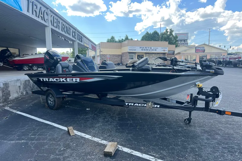 The Image of 2026 Tracker Pro Team 190 boat on trailer at dealership. - 0