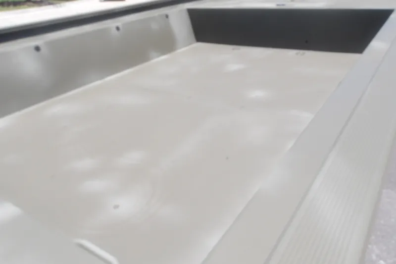 Slide: The Image of 2026 Tracker Grizzly 1860 Utility boat interior, showcasing spacious and durable design. - 4