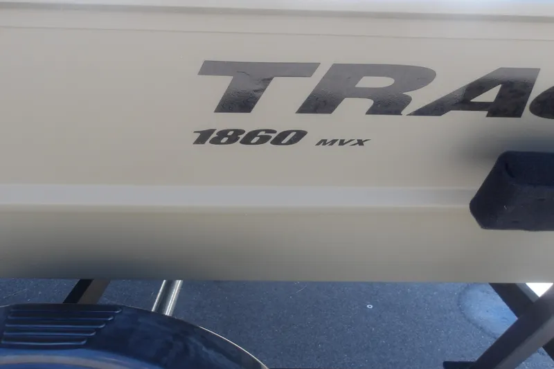 Slide: The Image of 2026 Tracker Grizzly 1860 Utility boat side view with model branding. - 11
