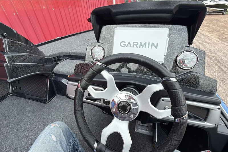 Slide: The Image of Steering wheel and dashboard of 2026 Nitro Z20 XL Pro boat with Garmin display. - 5