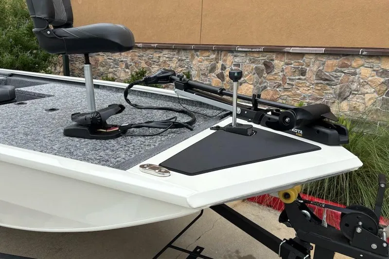 Slide: The Image of 2026 Tracker Pro 170 boat with trolling motor and swivel seat on deck. - 4