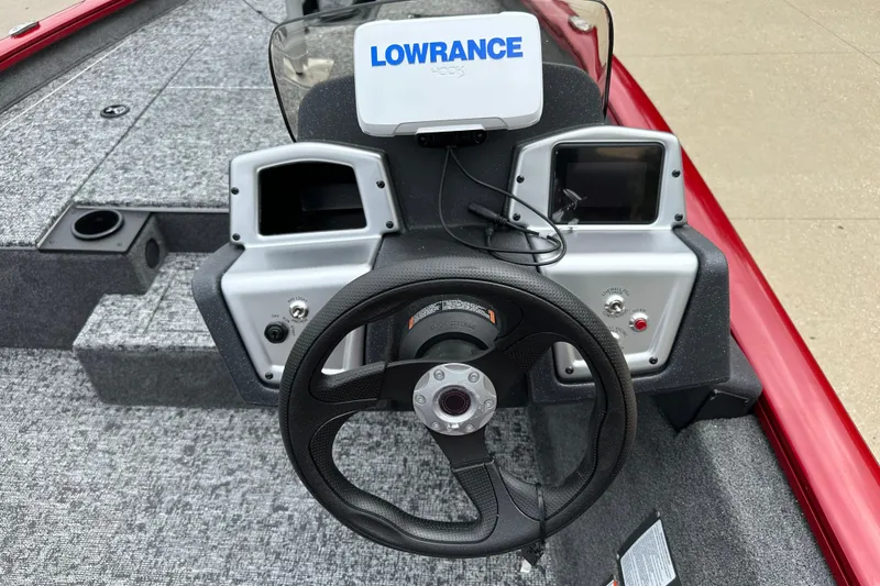 Slide: The Image of 2026 Tracker Pro Team 175 boat dashboard with Lowrance electronics and steering wheel. - 5