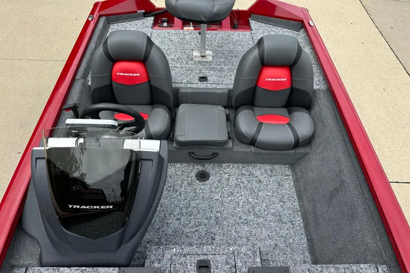 Slide: The Image of 2026 Tracker Pro Team 175 boat interior with red and gray seating. - 6
