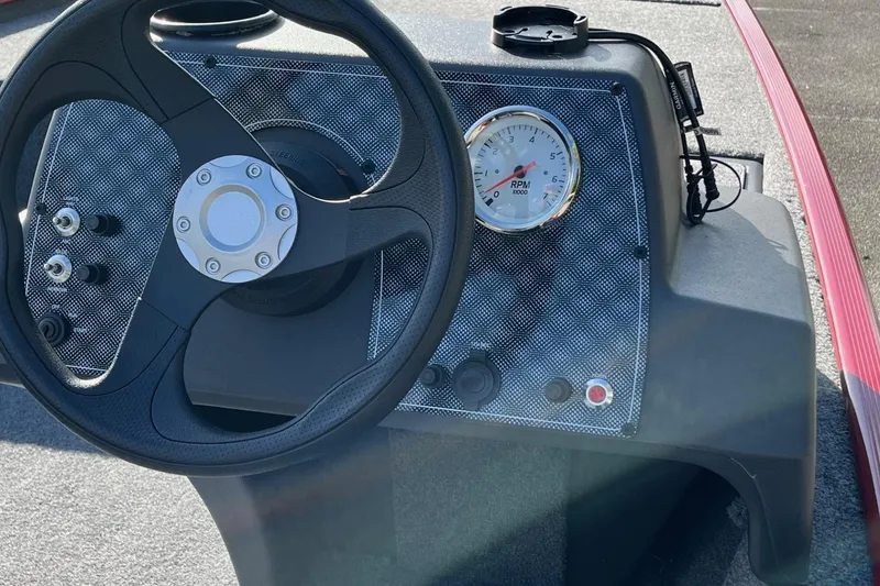 Slide: The Image of Steering console of 2026 Tracker Bass Tracker Classic XL with RPM gauge. - 4