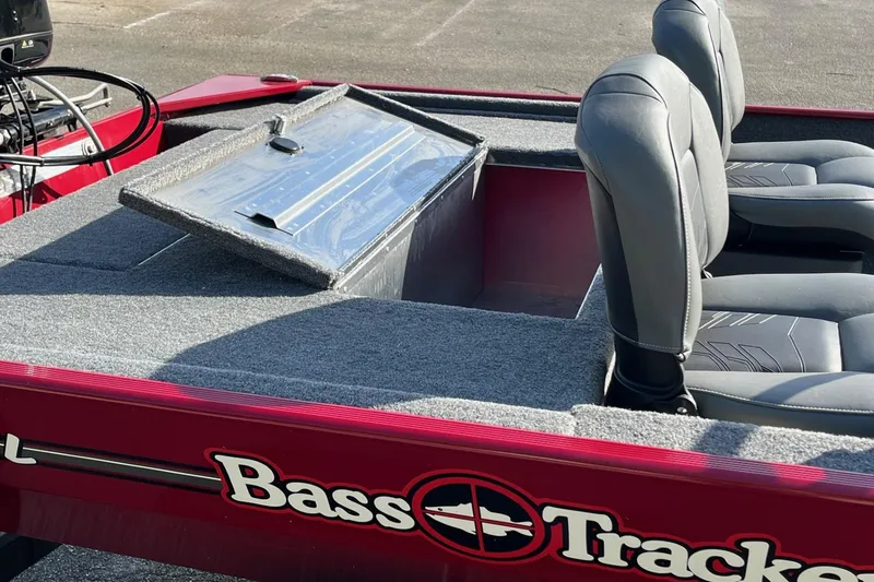 Slide: The Image of 2026 Tracker Bass Tracker Classic XL boat interior with dual seats and steering console. - 6
