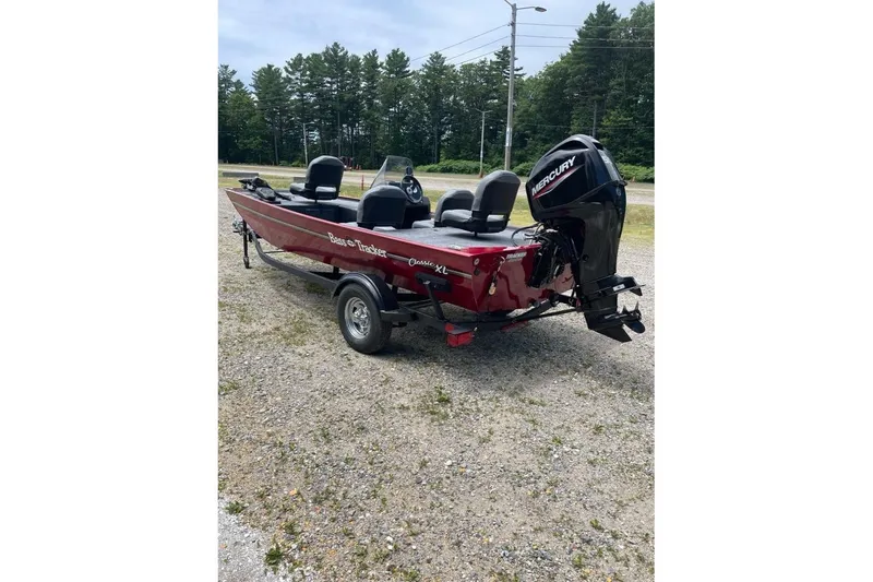 Slide: The Image of 2026 Tracker Bass Tracker Classic XL boat with Mercury engine on a trailer. - 3