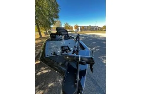 Slide: The Image of 2026 Tracker Pro Team 175 boat parked outdoors on a sunny day. - 6