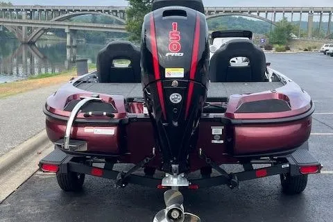Slide: The Image of 2026 Nitro Z18 Pro boat with Mercury Pro XS engine in parking lot. - 3