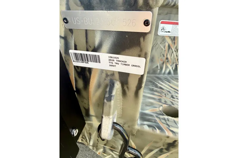Slide: The Image of 2026 Tracker Grizzly 1650 T Prairie Wings Edition, camouflage detail with identification plate. - 17