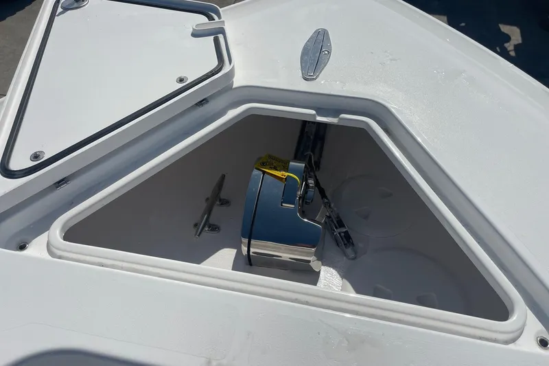 Slide: The Image of Anchor compartment of 2026 Contender 32 ST boat, featuring a sleek, modern design. - 13