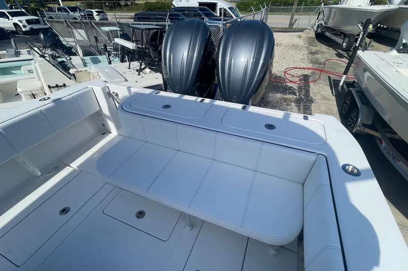 Slide: The Image of 2026 Contender 32 ST boat with dual engines and spacious seating area. - 3