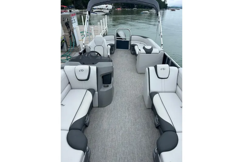 Slide: The Image of 2022 Avalon 22 LSZ Quad pontoon boat with spacious seating and modern design. - 3
