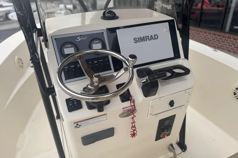 Slide: The Image of Control panel of 2020 Scout 195 Sportfish boat with Simrad display. - 8