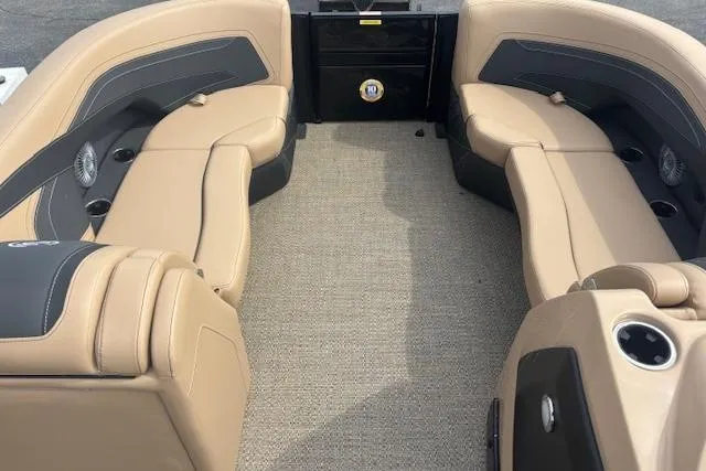 Slide: The Image of 2026 Barletta C22UC boat interior with beige seating and carpeted floor. - 4