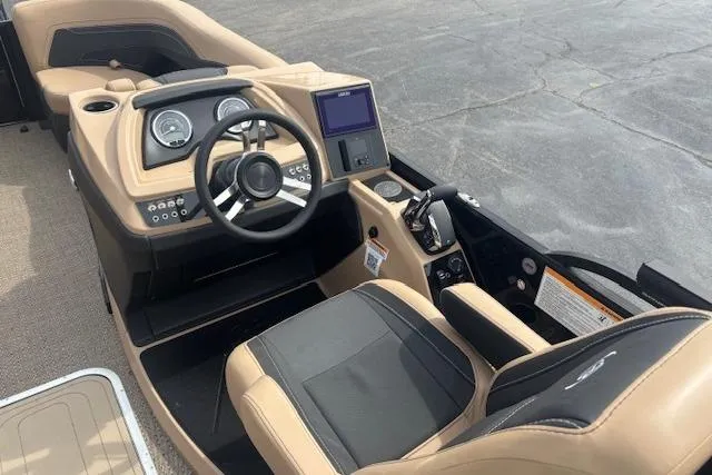 Slide: The Image of 2026 Barletta C22UC boat interior with modern dashboard and steering wheel. - 5