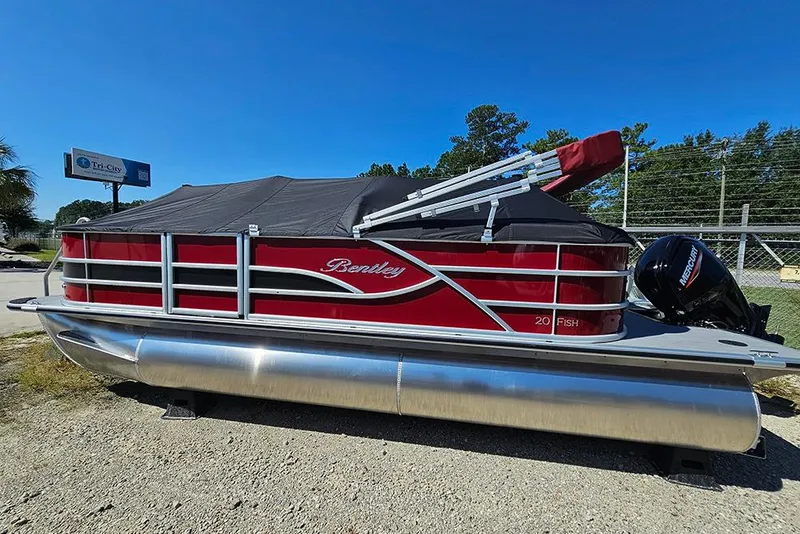 The Image of 2026 Bentley Pontoons 200 Fish CWT, red pontoon boat with cover, parked outdoors. - 0