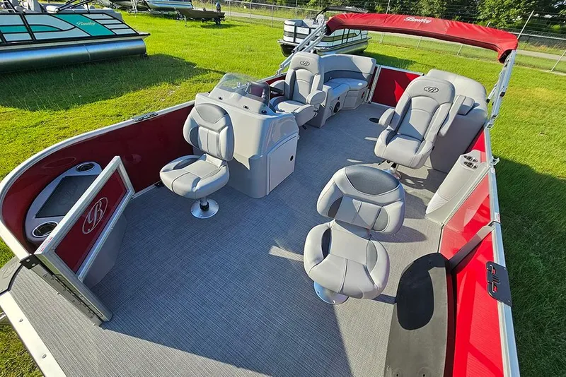 Slide: The Image of 2026 Bentley Pontoons 200 Fish CWT interior with gray seating and modern design. - 11