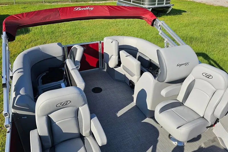 Slide: The Image of 2026 Bentley Pontoons 200 Fish CWT with spacious seating and modern design on grassy area. - 14