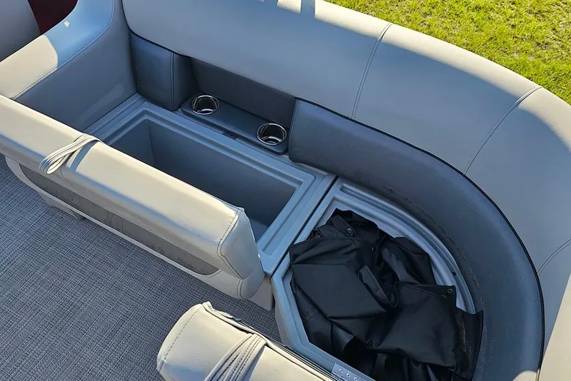 Slide: The Image of 2026 Bentley Pontoons 200 Fish CWT interior with gray seating and red canopy. - 15