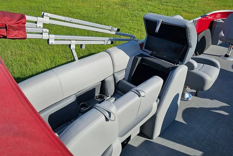 Slide: The Image of 2026 Bentley Pontoons 200 Fish CWT with luxurious seating and red canopy on grassy background. - 16