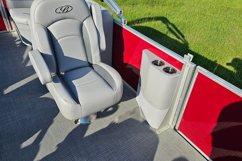 Slide: The Image of 2026 Bentley Pontoons 200 Fish CWT interior seating with storage and cup holders. - 17