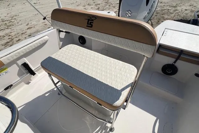 Slide: The Image of 2026 Carolina Skiff 17 LS boat seat with beige and white upholstery, diamond pattern design. - 4