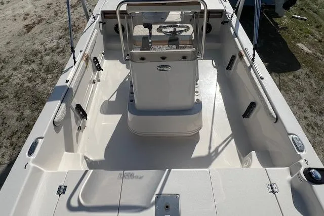 Slide: The Image of 2026 Carolina Skiff 17 LS boat interior with center console and seating. - 7