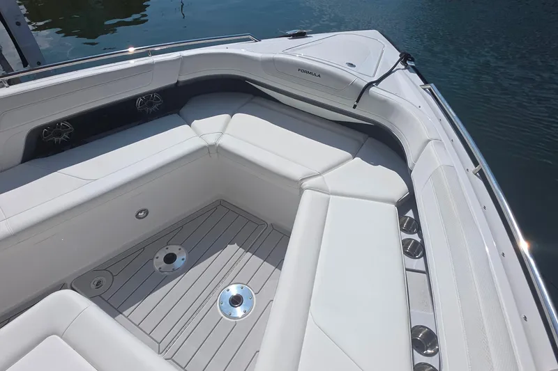 Slide: The Image of 2026 Formula 360 Crossover Bowrider I/O with spacious white seating and sleek design. - 30