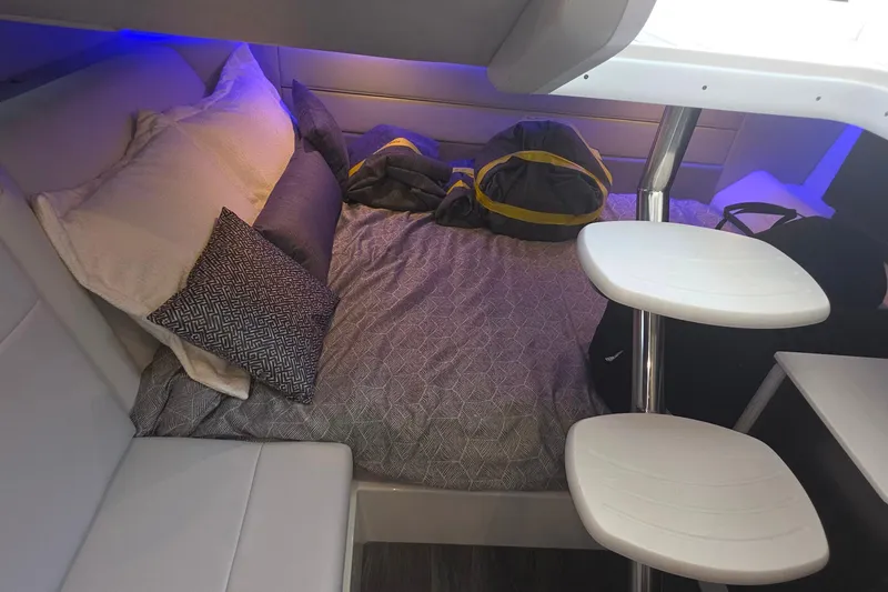 Slide: The Image of Interior cabin of 2026 Formula 360 Crossover Bowrider I/O with cozy bedding and modern design. - 36