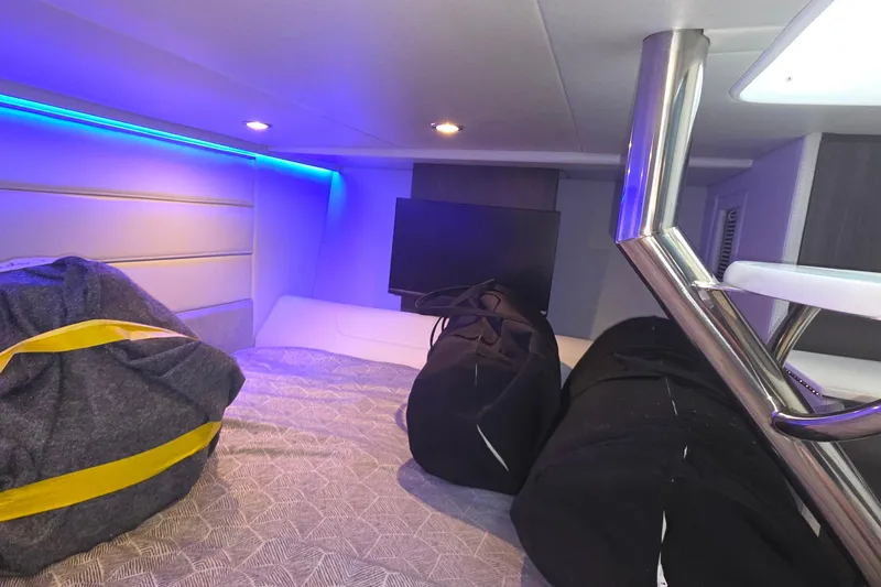 Slide: The Image of Interior cabin of 2026 Formula 360 Crossover Bowrider I/O with modern lighting and storage bags. - 37