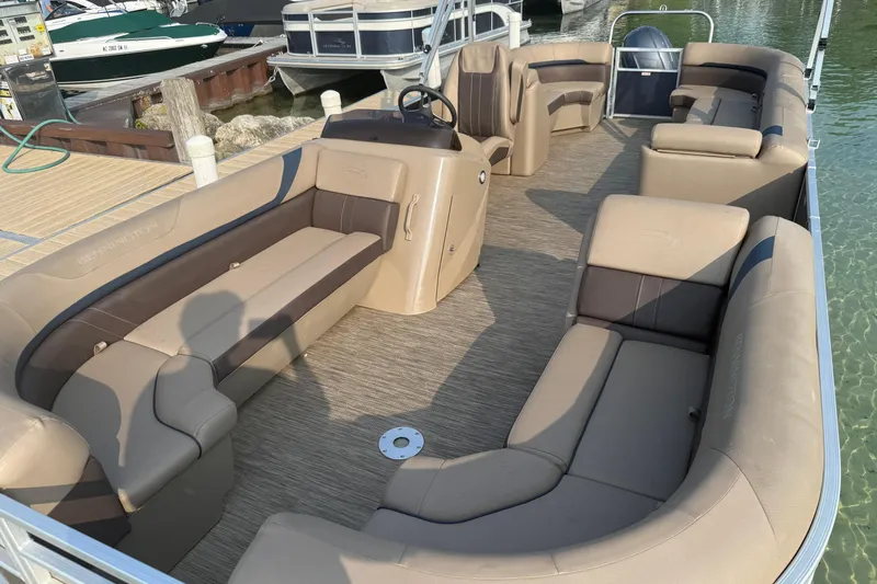 Slide: The Image of 2023 Bennington 24 SSR pontoon boat with spacious seating and modern design. - 3